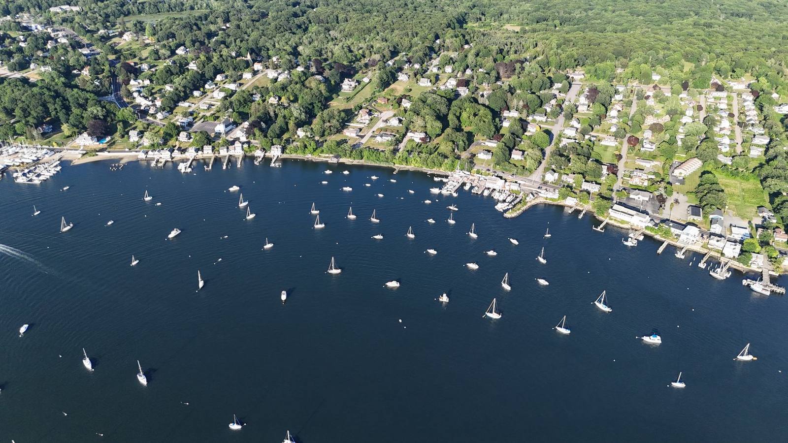 Aerial view of the mooring field off the Tiverton shore on a summer evening